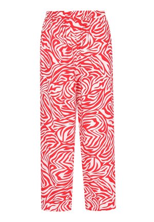 Red and white patterned pants with a loose fit, featuring a stretchy waistband and abstract swirl design throughout.