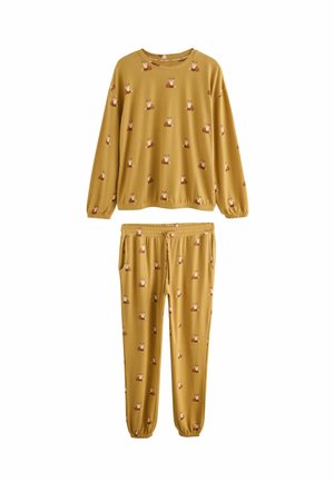 Yellow pajama set featuring a crewneck long-sleeve top and elastic waistband pants, adorned with a repeated fox pattern. Soft fabric texture.