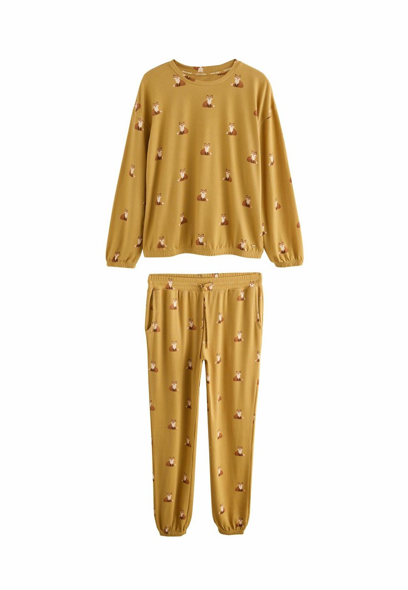 Set di pigiama giallo composto da una maglia a maniche lunghe con collo tondo e pantaloni con elastico in vita, decorato con un motivo a volpe ripetuto. Tessuto morbido.