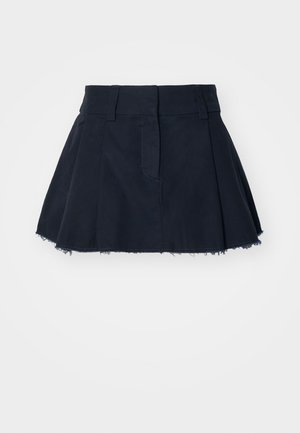 Tumši zils kokvilnas svārks ar izsistītu formu, ar krokām, saplēstu apakšu un jostu ar jostu cilpām.