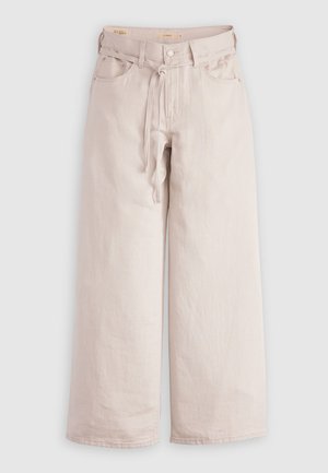 Beige weite Jeans aus Denim, mit hoher Taille, großen Fronttaschen und einem Frontband mit Knopfverschluss.