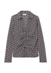 Blouse à manches longues noire et blanche avec un motif en vagues, col et fronces à l'avant avec des détails de boutons pour la fermeture. Tissu en mélange de coton.