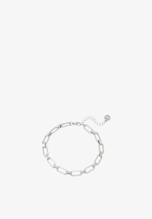 Bracelet à chaîne en argent avec des maillons allongés, une finition métallique lisse et un fermoir réglable avec une petite pastille ronde.