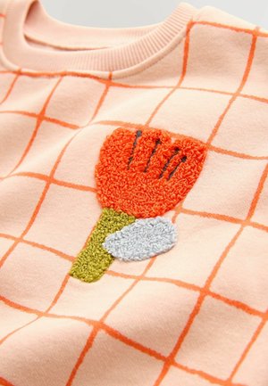 Ferskenfarvet sweatshirt med ternet mønster. Har tekstureret blomsterbroderi i orange, grøn og lyseblå. Blødt stof med rund hals.