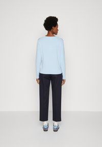 Tommy Hilfiger Pulover - well water
