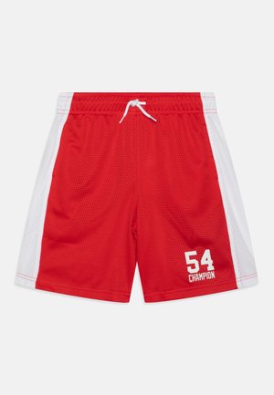 Shorts de sport rouges en tissu en maille, avec un panneau latéral blanc et un logo "54" blanc avec le texte "CHAMPION" imprimé en dessous. Taille élastique avec cordon de serrage.