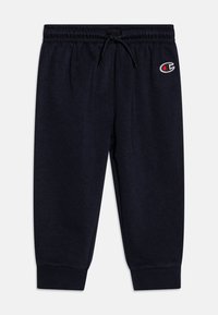 Pantalones de chándal en color navy, confeccionados con una tela suave, que cuentan con una cinturilla elástica con cordón ajustable, puños acanalados y un pequeño logo en el muslo.