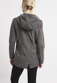 Gray patterned jacket with a hood, detailed fabric texture, and dark brown shoulder accents. Features an adjustable drawstring at the hem.