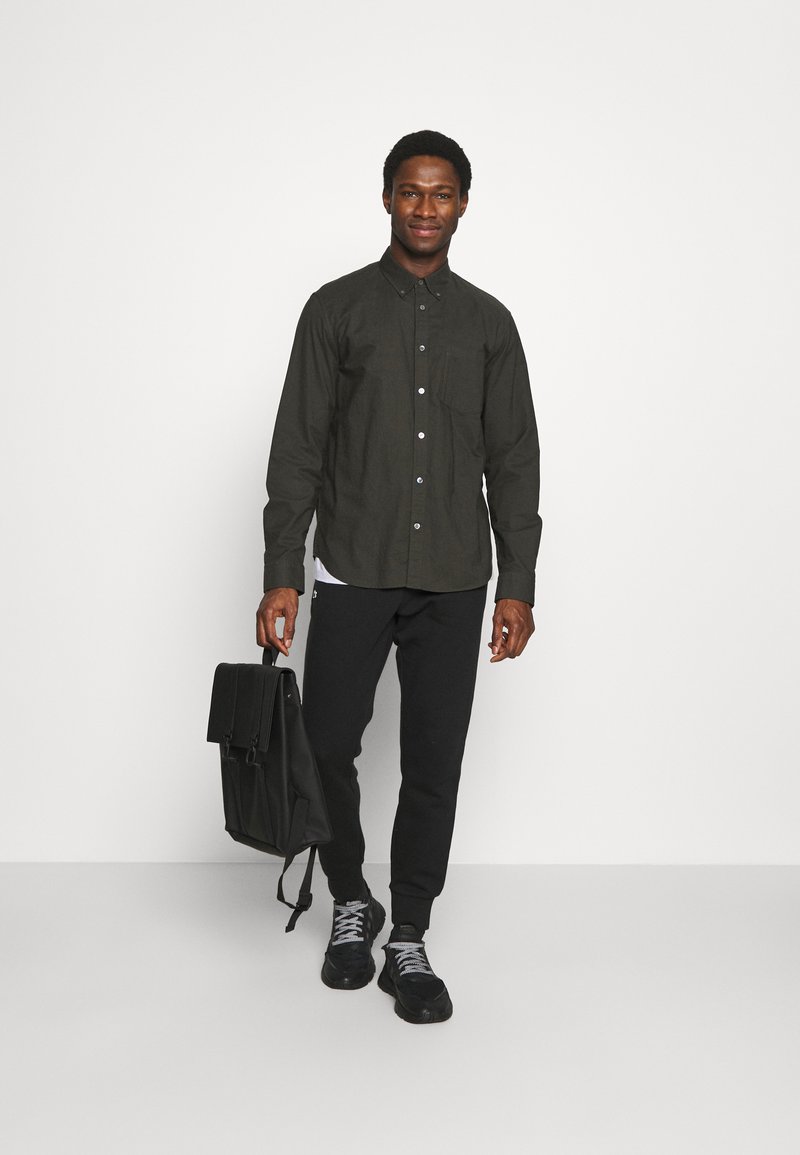 Herren Trainingsanzüge | Lacoste Jogginghose black/schwarz - SC78494 Herren Trainingsanzüge | Lacoste Jogginghose black/schwarz - SC78494