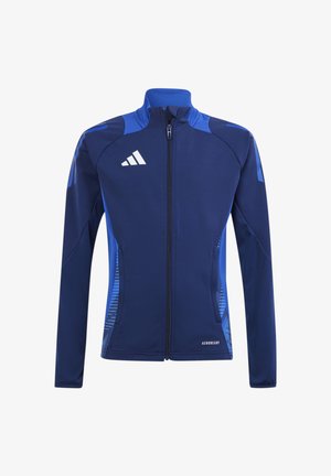 Marineblaue Sportjacke mit Reißverschluss vorne, weißem Logo, blauen Akzenten und gemusterten Seitenpaneelen. Hergestellt aus atmungsaktivem Material.