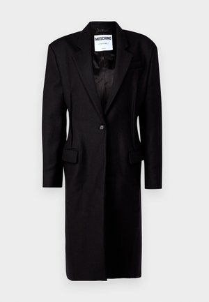Schwarze Blazerjacke mit Reverskragen, Einzelknopfverschluss, zwei frontalen Taschen und einer längeren Silhouette. Hergestellt aus einem strukturierten Wollmischgewebe.