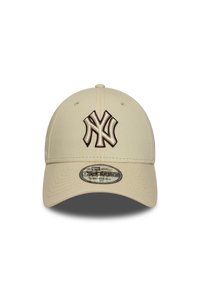 Beige cap made of fabric, featuring a raised dark brown NY logo on the front, adjustable strap at the back, and a rounded peak design.