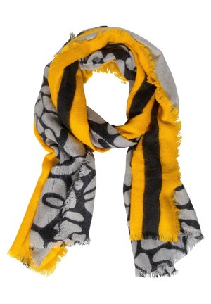Gele en grijze sjaal met opvallende zwarte patronen, zachte textuur en rafelige randen. Lichtgewicht en rechthoekige vorm, ideaal om te combineren.