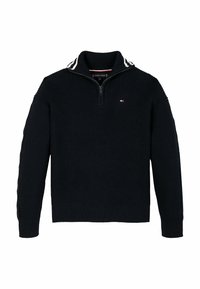 Pull tricoté bleu marine avec col demi-fermeture éclair, manches côtelées et rayures latérales. Petite écusson logo près du col.