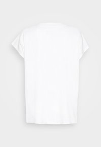 Vit kortärmad T-shirt i mjukt, slätt tyg. Lätt lös passform med rundad halsringning. Minimalistisk design utan mönster eller detaljer.