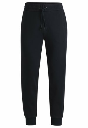 Svarta sweatpants med elastisk midja och justerbar dragsko, med ribbade muddar och sidofickor; tillverkade av mjukt, strukturerat tyg.