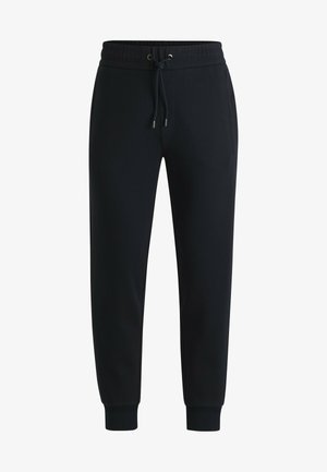 Black sweatpants with an elastic waistband and adjustable drawstring, featuring ribbed cuffs and side pockets; made of soft, textured fabric.