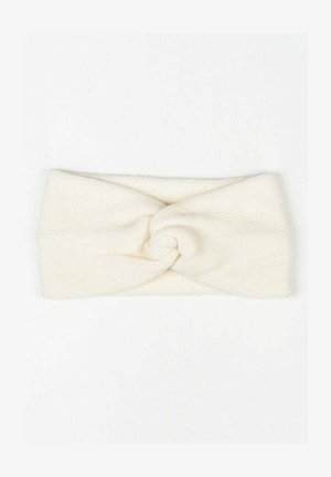 Light beige knitted headband with a twisted knot design at the front. Soft texture and stretchable material suitable for various head sizes.