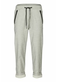 Helle graue Jogginghosen aus weichem Stoff, mit schwarzen Reißverschlusstaschen und einem Kordelzugbund, sowie umgeschlagenen Bündchen am Knöchel.