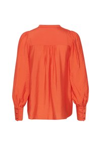 Orange blouse featuring a relaxed fit, puffed sleeves, and buttoned cuffs. The textured fabric has subtle shine and gathering at the back.