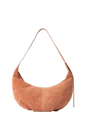 Soft tan suede crescent-shaped shoulder bag with a thin strap and a zip closure on the side.
