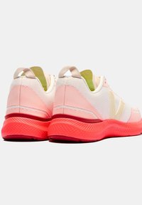 Sport shoes with a mesh upper in white and pink gradient, thick red sole, padded collar, and heel pull tab for easy wear.