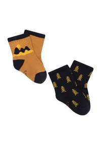 Deux paires de chaussettes : une orange avec un design de montagne et de soleil, et une marine avec des motifs d'arbres jaunes. Texture côtelée, poignets contrastés.