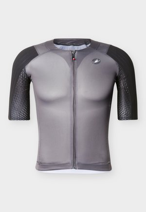 Grijs compressie sportshirt met korte mouwen, met zwarte gestructureerde panelen op de mouwen en een ritssluiting aan de voorkant.
