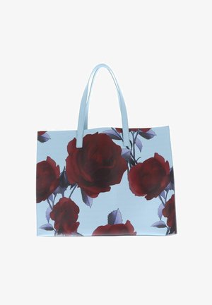 Sac fourre-tout bleu clair avec de grandes roses rouge foncé et des feuilles violettes imprimées, doté de deux longues anses.