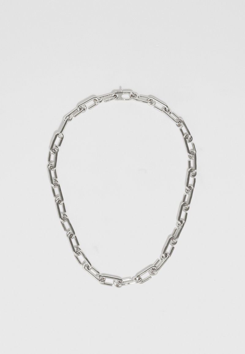 Silver metal chain necklace with elongated links, featuring a smooth texture and polished finish, suitable for casual or formal wear.