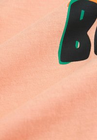 Next SHORT SLEEVE - T-shirt med print - peach pink paradise beach