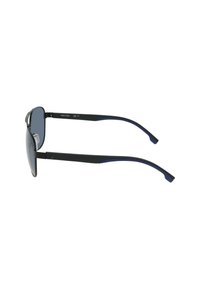Occhiali da sole Nautica con una montatura nera elegante e dettagli blu, lenti scure e un design leggero. Supporti nasali sottili per il comfort.