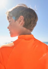 Next SHORT SLEEVE SUNSAFE  - Surfertrøjer - orange