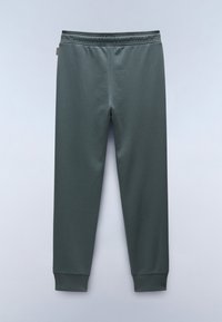 Dunkelgrüne Jogginghose mit einem elastischen Bund, schmal zulaufenden Beinen und gerippten Bündchen, aus weichem, strapazierfähigem Stoff. Einfaches Design, keine Muster.