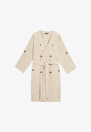 Beige katoenen badjas met een wikkelontwerp, lange mouwen, zwarte knopen en een bijpassende ceintuur. Voorzien van zijzakken en een soepele textuur.