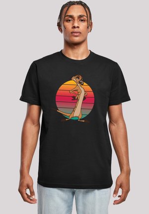Black cotton t-shirt featuring a cartoon character in front of a gradient circle with orange and pink hues. Relaxed fit, short sleeves.