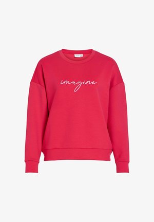 Felpa rossa con vestibilità ampia, collo tondo e maniche lunghe. Presenta la parola "imagine" ricamata in corsivo bianco sulla parte anteriore.