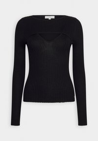 Haut noir à manches longues côtelé avec décolleté en V et détail découpé en dessous du col. Présente un design ajusté et un tissu texturé.