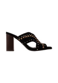 Sandale mule noire à bout ouvert avec talon bloc, ornée de clous ronds dorés et argentés sur la bride supérieure.