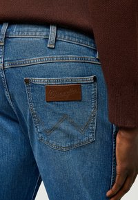 Wrangler Bootcut-teksad - sky breeze