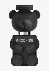 Butelka perfum w kształcie czarnej niedźwiedzi, matowa wykończenie, srebrne akcenty i kwadratowa nakrętka. Na butelce w wyraźny sposób widnieje logo "MOSCHINO".