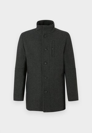 Manteau en laine gris foncé avec un col montant, six boutons sur le devant et une poche poitrine. Il présente un motif chevrons texturé et une coupe droite.