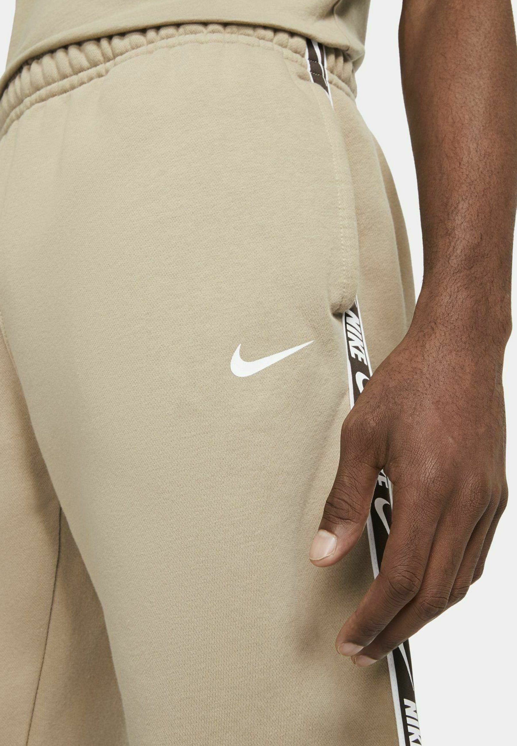 nike khaki tracksuit womens