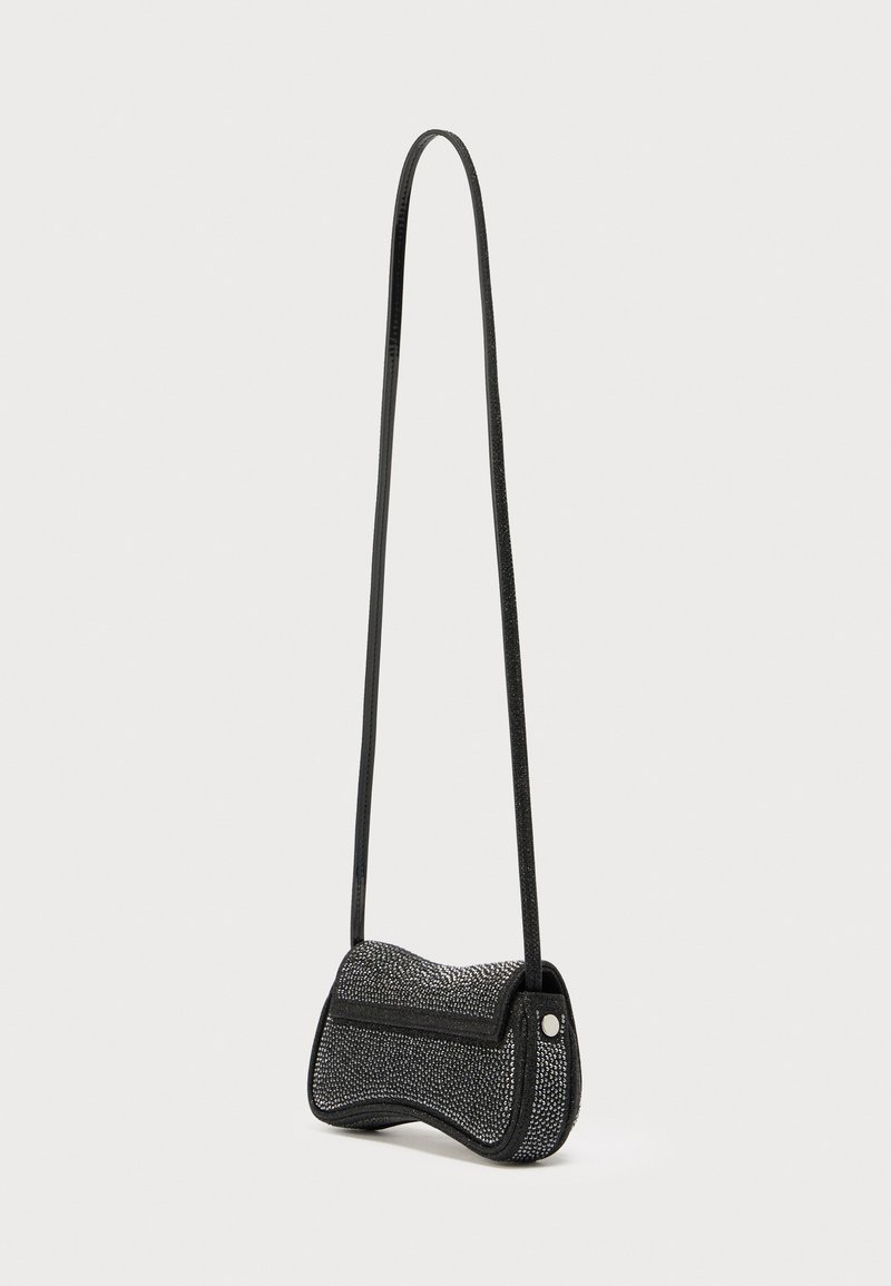 Black bag with a structured shape, textured outer surface, and a long, thin strap. Features a subtle shine and a rounded base.