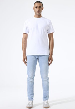 Jeans Tapered Fit - light used