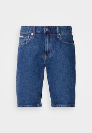 Jeanshorts i mørkeblå, med klassisk fem-lommers design, synlige sømmer og en rett passform med kne-lengde.