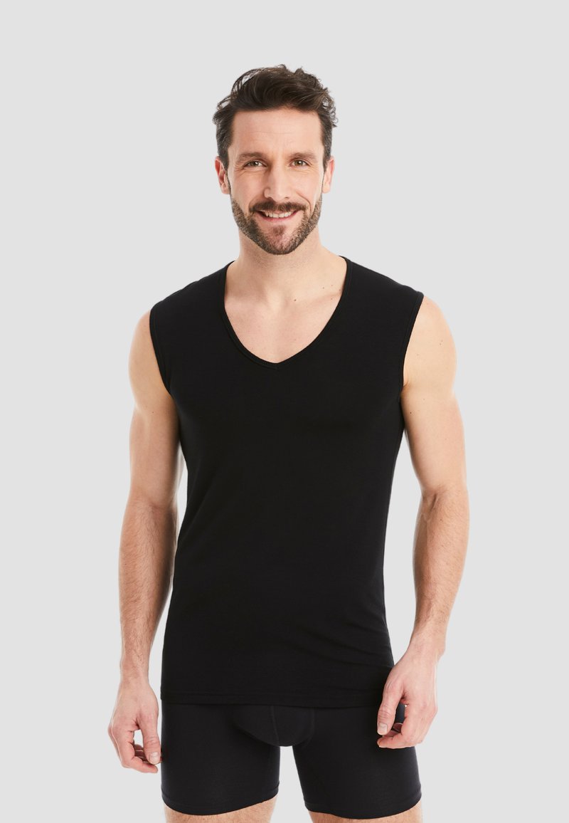 Black sleeveless v-neck tank top in a soft, stretchy fabric. Features a fitted design with no patterns and smooth edges.