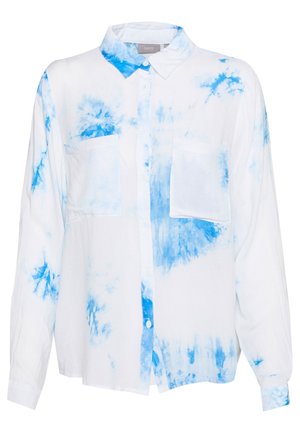 White button-up shirt featuring a blue tie-dye pattern, two chest pockets, long sleeves, and a collared neckline. Soft fabric texture.