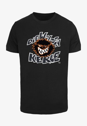 Schwarzes Baumwoll-T-Shirt mit einem grafischen Design eines lächelnden, flauschigen Charakters und fettem Text: "DIE WILDEN KERLE" in Weiß und Orange.
