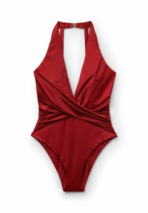 Maillot de bain une pièce rouge avec un décolleté plongeant, un design dos nu, des côtés froncés et un bas ajusté. Confectionné en tissu lisse et extensible.